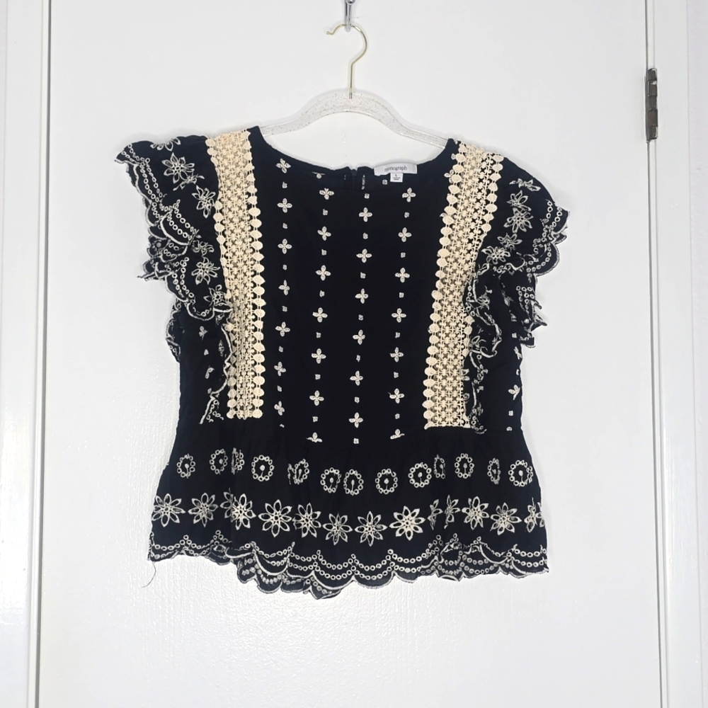 Black and white ruffle embroidered top